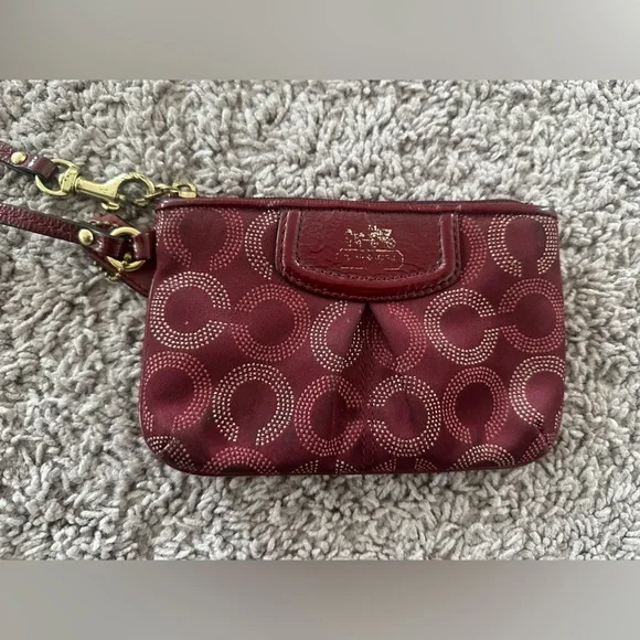 Preloved Coach Maroon Wristlet with Circular Design - Picture 1 of 5